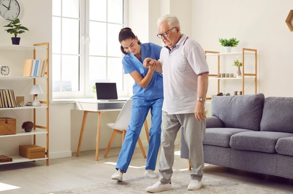 Ace Home Care providing post-hospital recovery support for a stroke survivor at home, showing a professional caregiver assisting an elderly patient with safe mobility and rehabilitation exercises in a home setting.