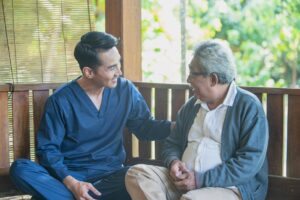 Caregiver offering compassionate support to a senior struggling with embarrassment about asking for help at Ace Home Care
