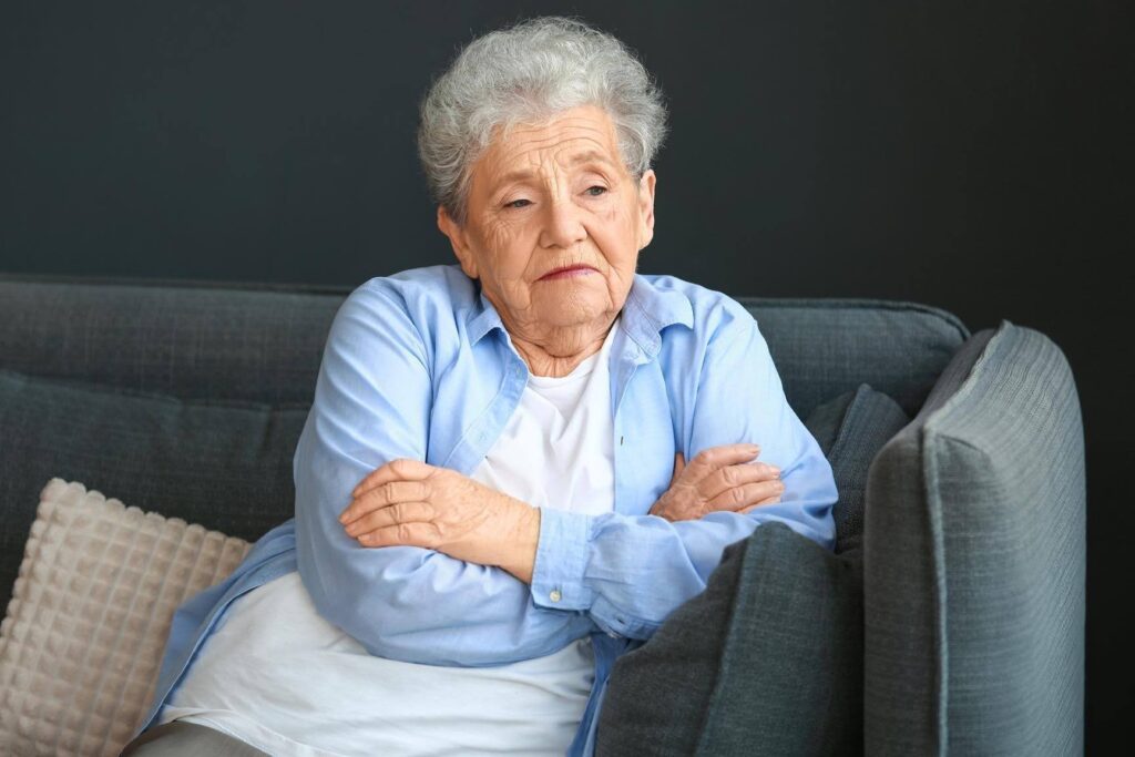 Senior wearing the same Clothes at home, highlighting how Ace Home Care helps families recognize changes in daily self-care habits