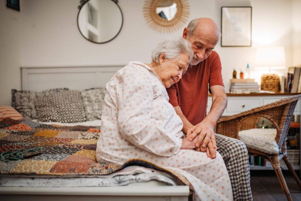 Loving spouse providing compassionate care and emotional support to an older adult at home, reflecting how Ace Home Care helps families when a spouse becomes the primary caregiver.