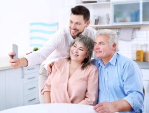 Family discussing home care options for an aging parent with support from Ace Home Care