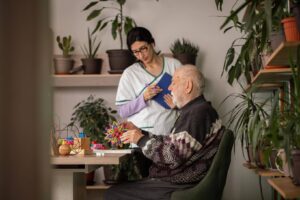 Older adult receiving personalized home care support with daily activities as Ace Home Care helps families determine appropriate weekly care hours.
